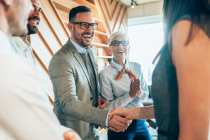 Accountant shaking hands